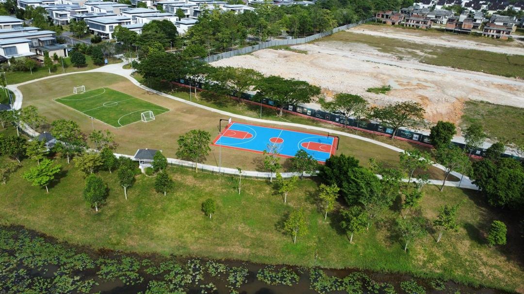 Aerial view of township sports park with futsal court and football field