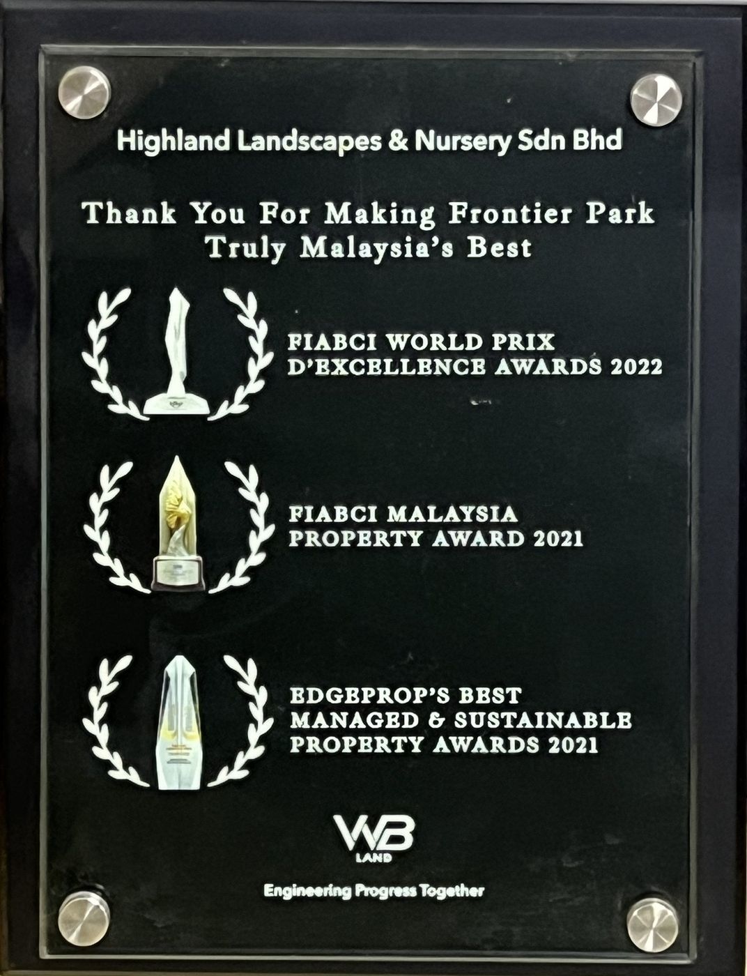 WB Land recognition plaque presented to Highland Landscapes & Nursery for Frontier Park